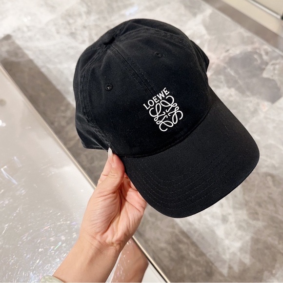 Meet the Posher Accessories - Loewe black sun hat baseball cap